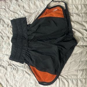 Orange, black, and grey free people shorts